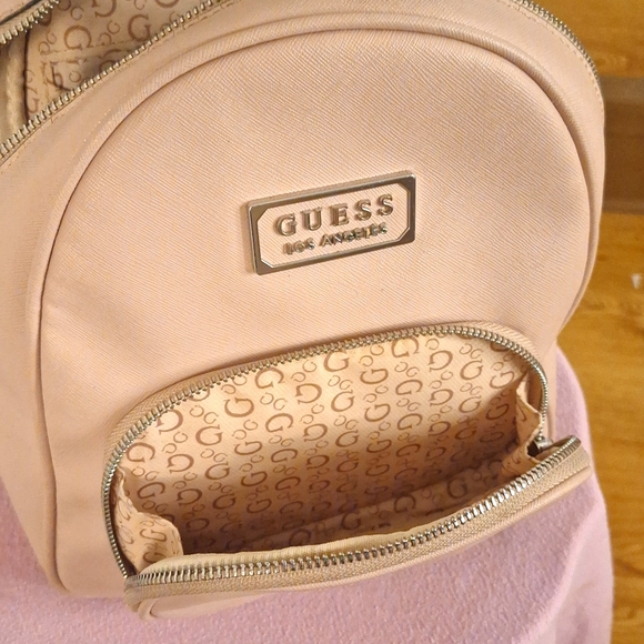 Women's Pink Guess Mini Backpack - Picture 8 of 8